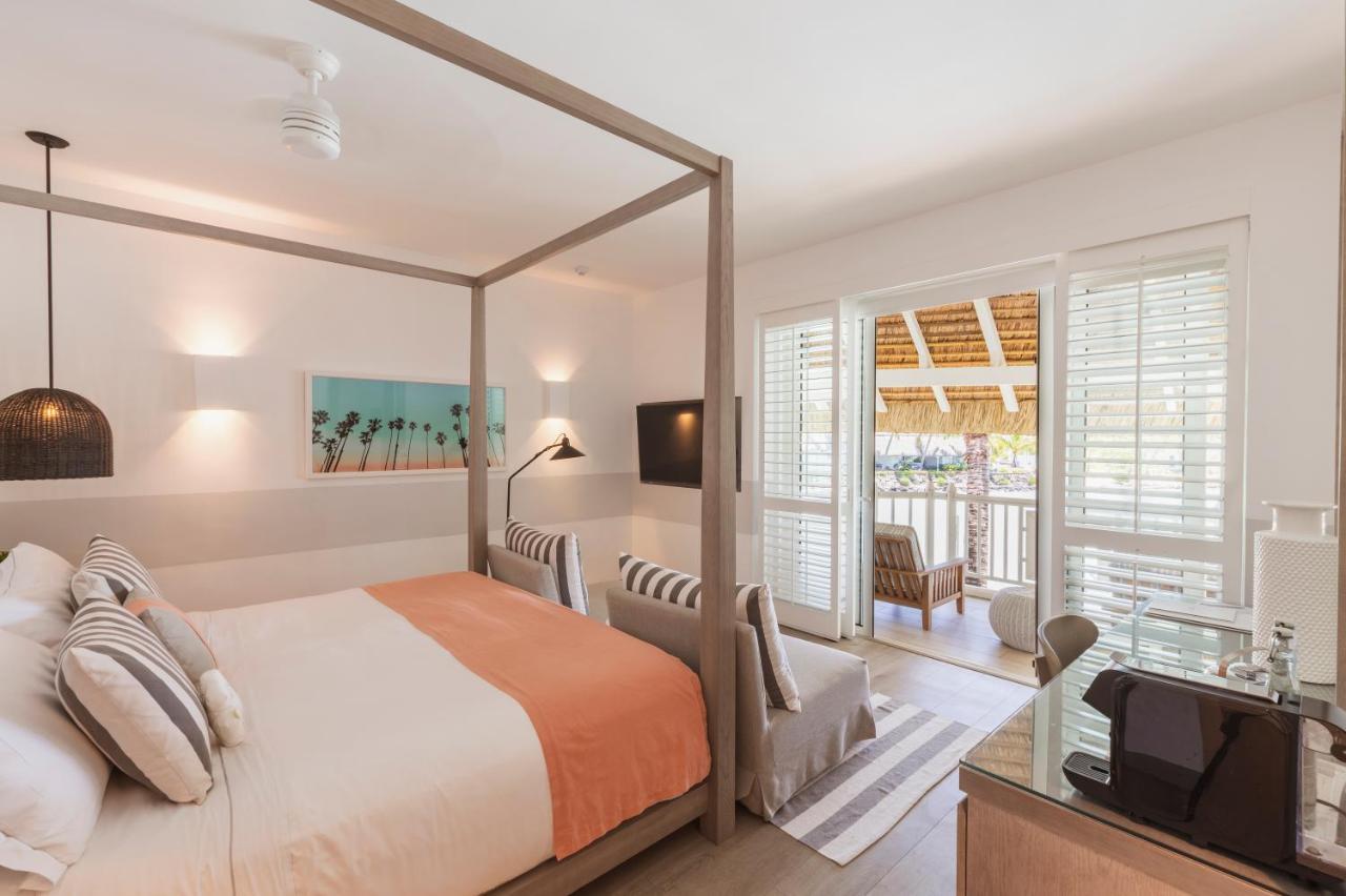 Lux* Grand Gaube Resort & Villas Luaran gambar A bedroom at the Shore Club